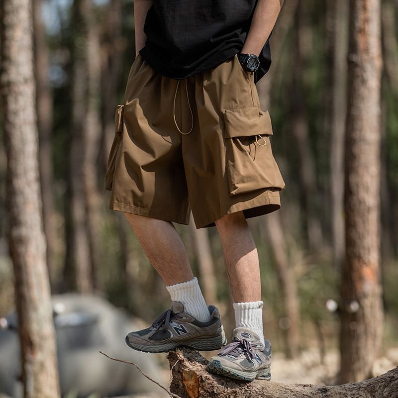 Men Casual Athleisure Solid Color Loose Drawstring Waist Cargo Shorts